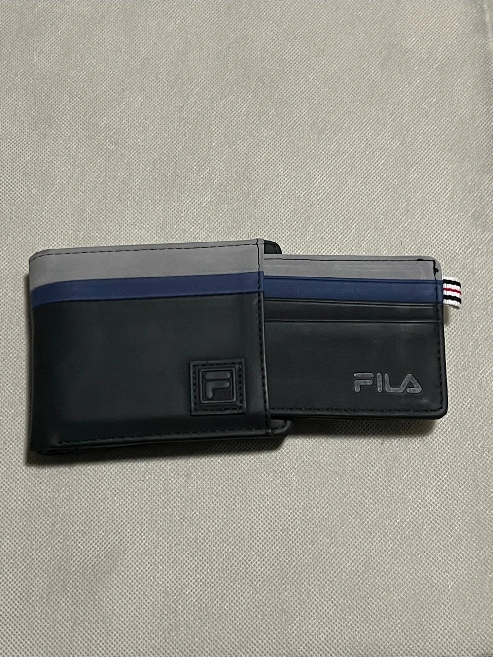 FILA Men's Colorblock Bifold Wallet with a Removable Passcase/Card Holder.